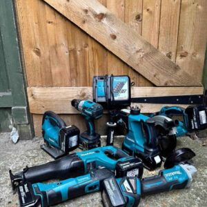 makita 40v max kit tools set Open Makita 40V Max XGT combo kit showing drill, impact driver, circular saw, reciprocating saw, batteries, and charger in a hard case. Makita XGT tools, 40V Max cordless kit, professional power tool combo, Makita drill and impact driver, XGT battery platform, job site tool set, brushless motor tools, Makita 40V saw kit, heavy-duty construction tools, cordless tool combo kit