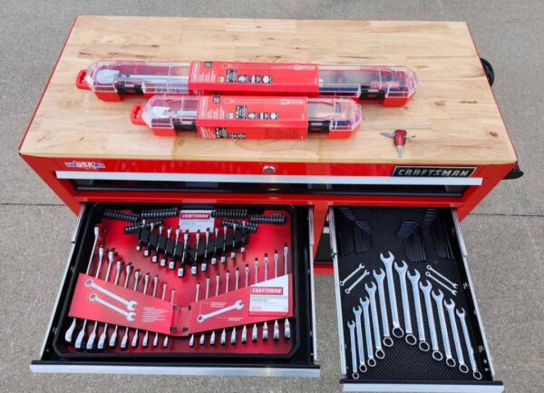 Open drawer view of heavy-duty tool storage cabinet with mechanics tool set Craftsman roller cabinet 41-inch in a professional garage works craftsman roller cabinet 41 inch