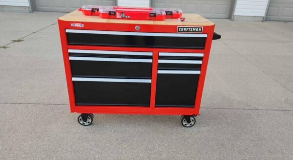 41-inch wide roller cabinet next to a car for scale in a home garage craftsman roller cabinet 41 inch