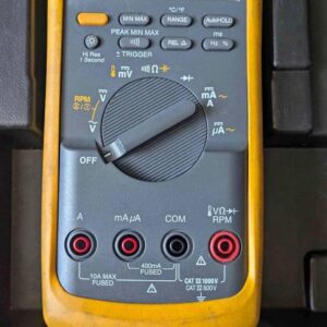 Fluke 88V Automotive Multimeter diagnosing a car engine's electrical system ..fluke 88v automotive multimeter