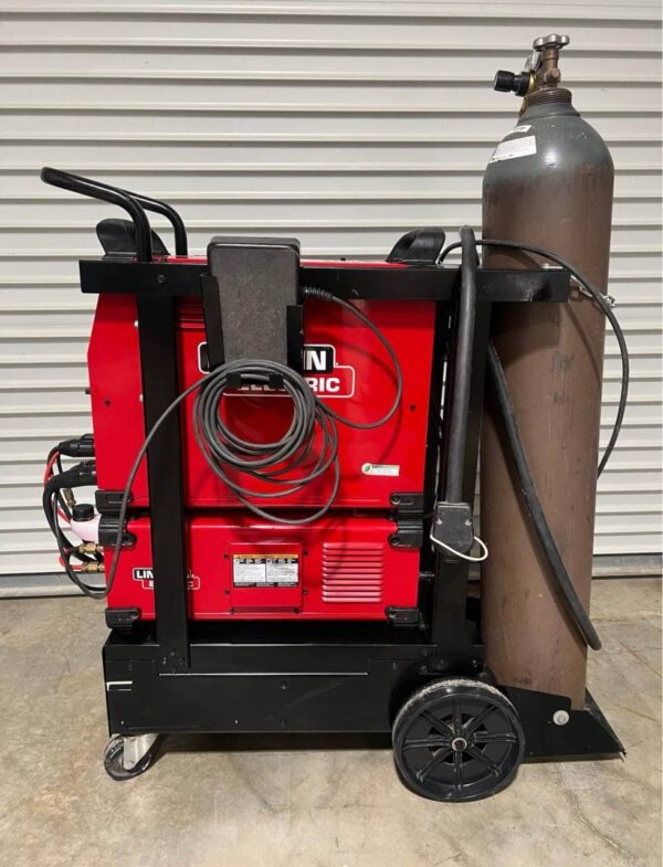 Lincoln Aspect 375 welder unit with TIG torch, power cable, and work clamp included in the box. lincoln aspect 375 lincoln aspect 375 tig welder