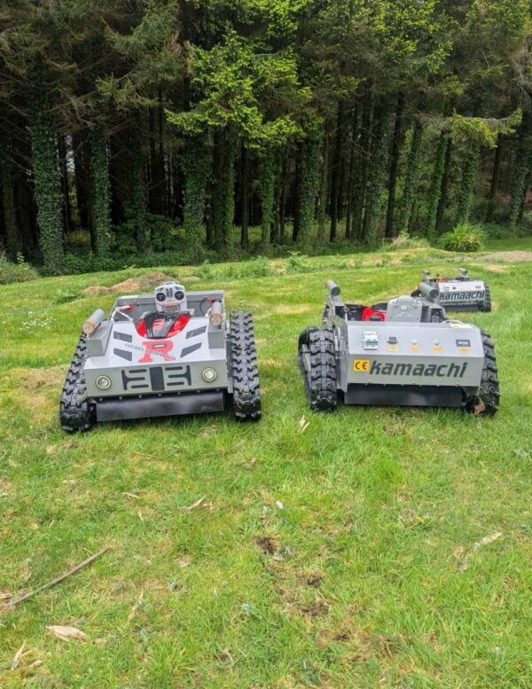 Kamaachi 4WD robotic lawn mower navigating a slope, an automatic smart grass cutter for all-terrain residential and commercial landscaping. kamaachi hybrid robot lawn mower 4wd & rv